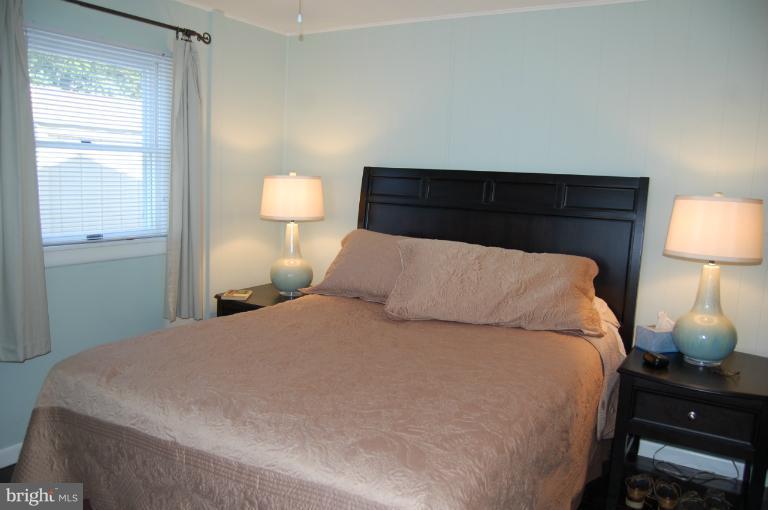 6140 Twin Point Cove Road Cambridge, MD 21613 - Photo 12 of 30 Master Bedroom With Half Bath