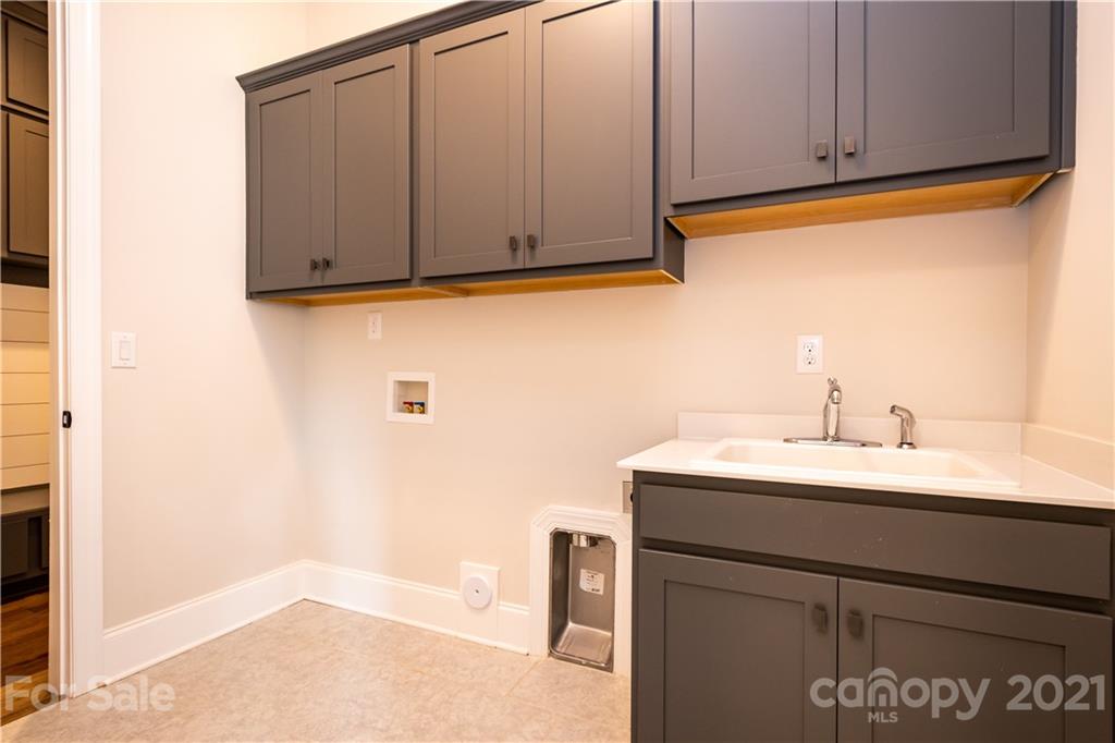 318 Grassy Rdg Court Clover, SC 29710 - Photo 22 of 31 a bathroom with a sink and a mirror