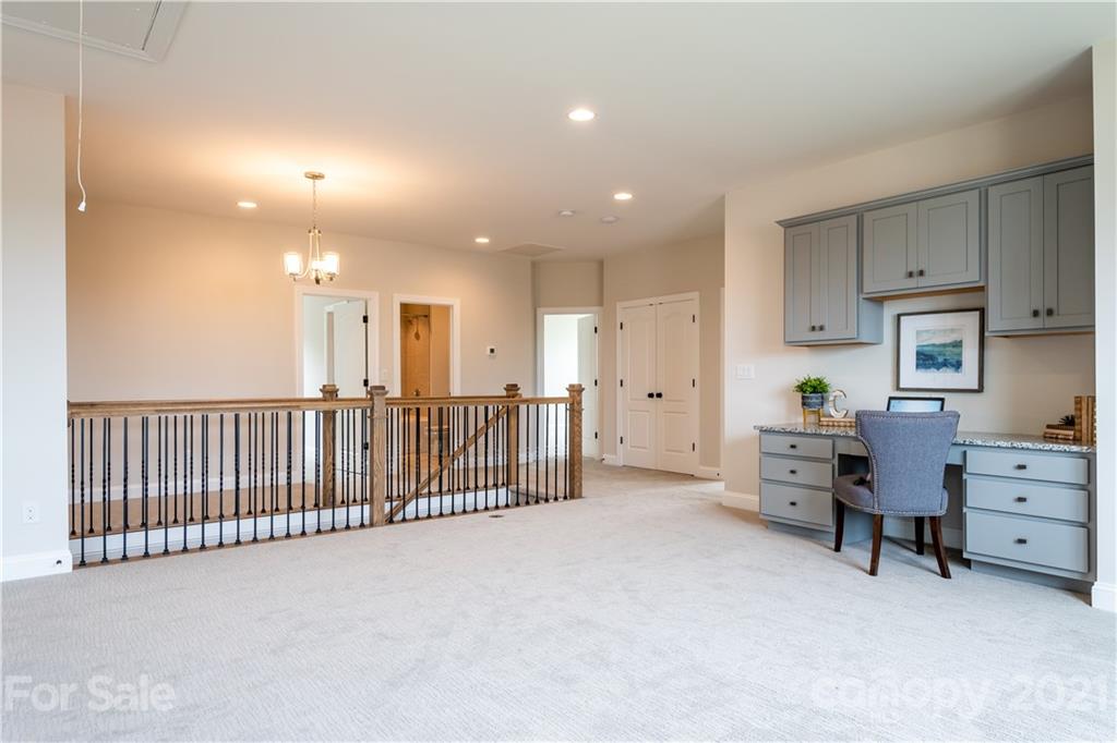 318 Grassy Rdg Court Clover, SC 29710 - Photo 23 of 31 a view of a big room with windows and cabinet