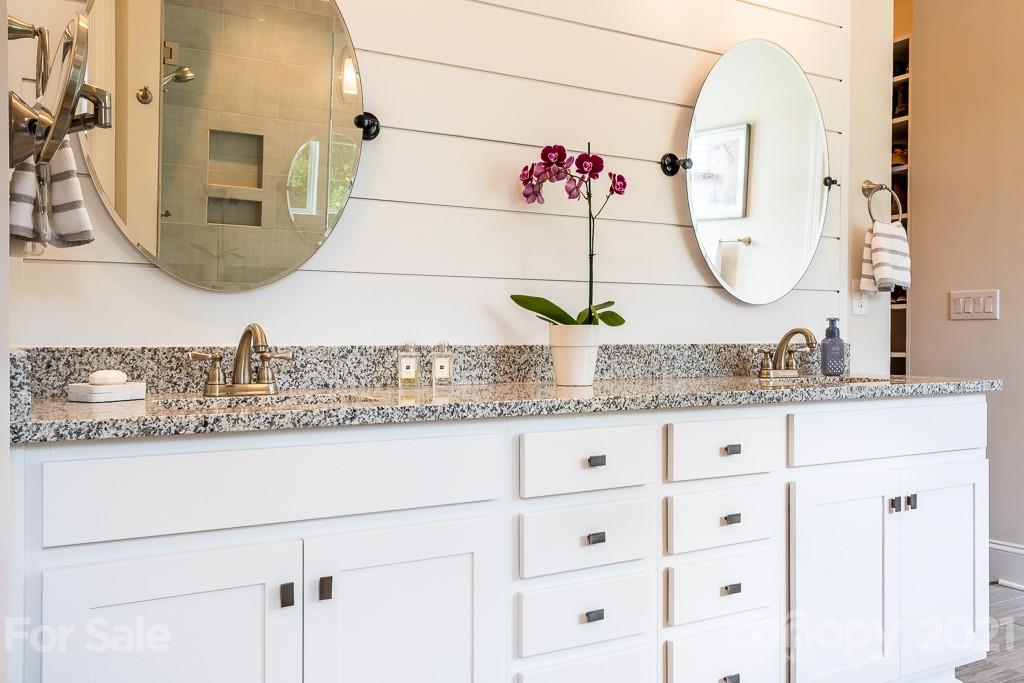 318 Grassy Rdg Court Clover, SC 29710 - Photo 26 of 31 a bathroom with a granite countertop sink and a mirror
