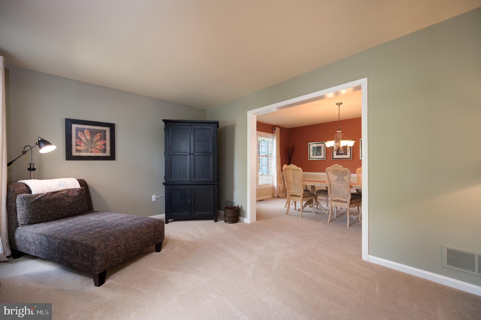 38 Arizona State Drive Newark, DE 19713 - Photo 6 of 39 Living room flows to the dining room