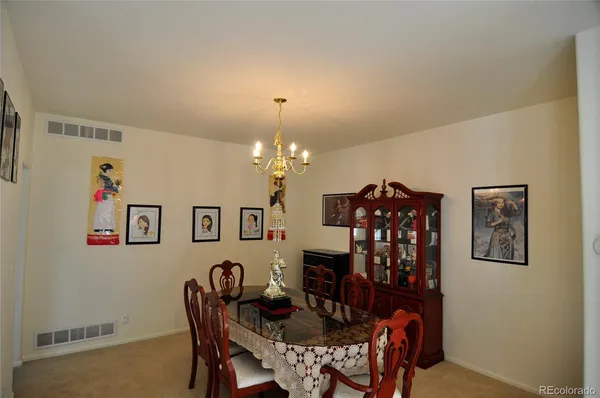 a view of a dining room with furniture