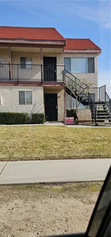 a view of a house with a terrace