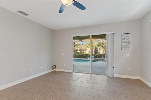 a view of swimming pool with outdoor seating