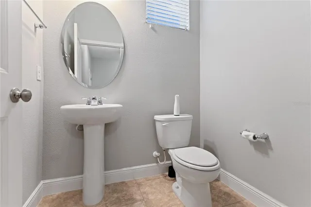 an aerial view of residential houses with city view