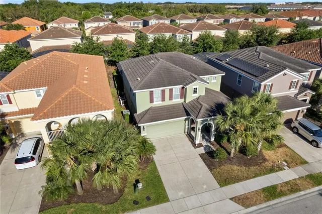 an aerial view of residential building with outdoor space