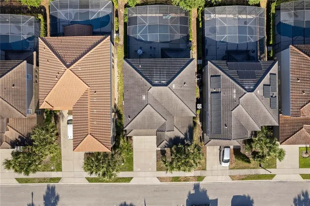an aerial view of residential building with city view