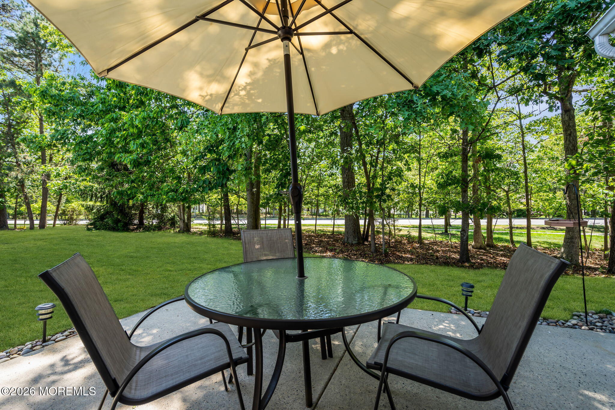 10 Congressional Road Jackson, NJ 08527 - Photo 54 of 72 a view of a backyard with a garden and patio