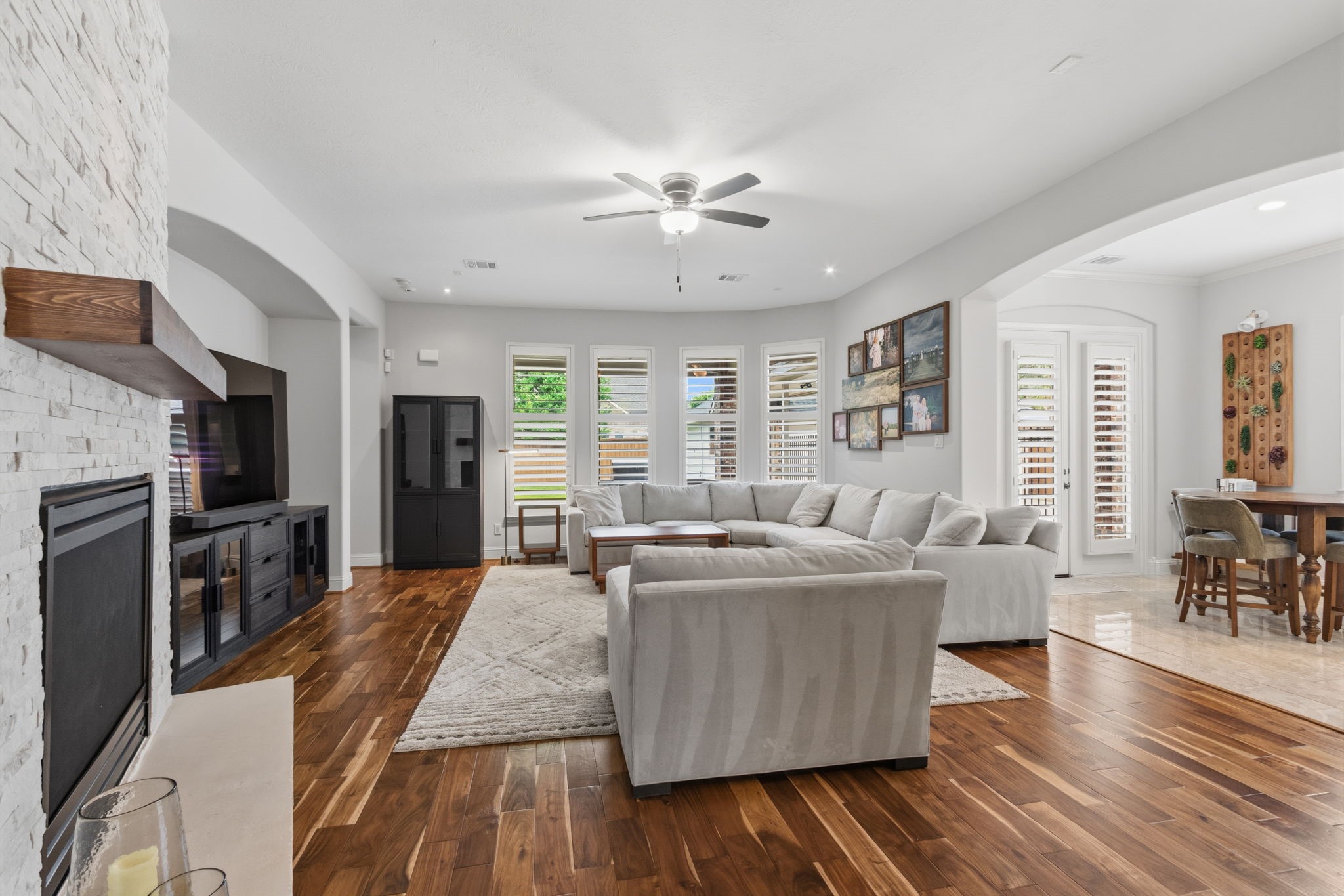 20130 Rose Dawn Lane Spring, TX 77379 - Photo 9 of 50 Family room with remodeled fireplace and plantation shutters