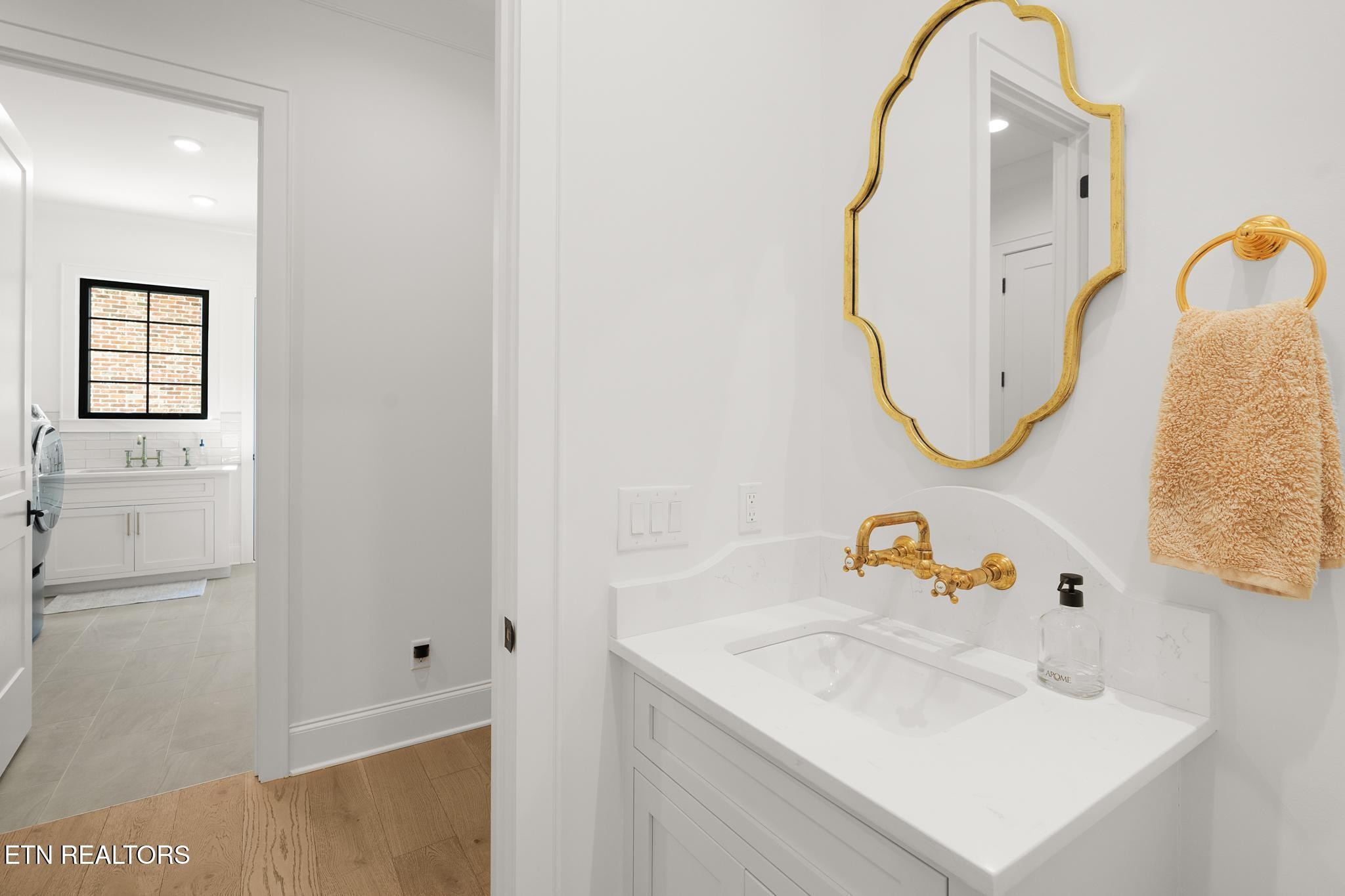 3693 Herschel Hudson Road Lascassas, TN 37085 - Photo 19 of 51 a bathroom with a sink vanity and a mirror