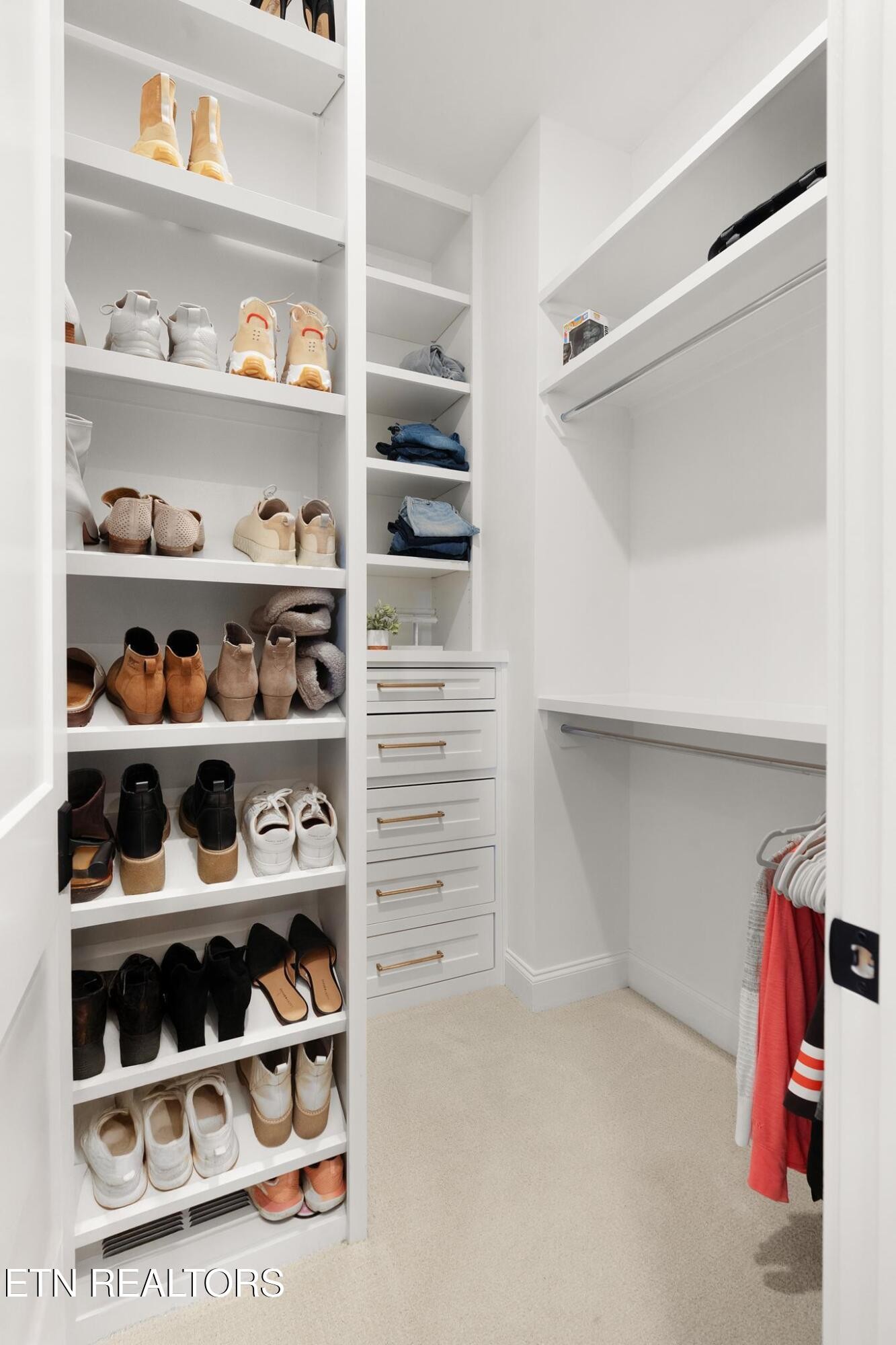 3693 Herschel Hudson Road Lascassas, TN 37085 - Photo 25 of 51 a view of walk in closet with clothes and shoes