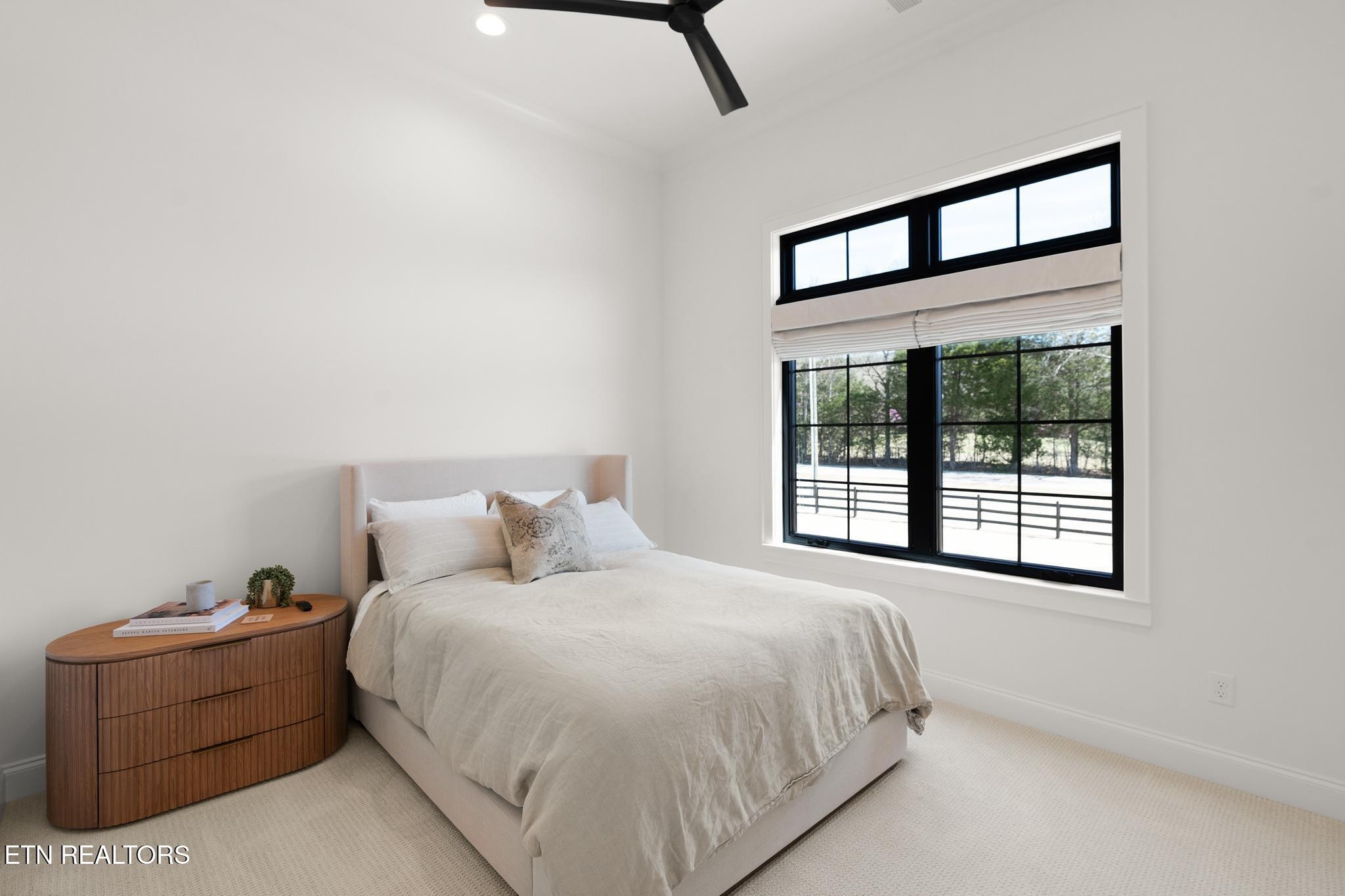 3693 Herschel Hudson Road Lascassas, TN 37085 - Photo 27 of 51 a large bed sitting in a bedroom next to a window