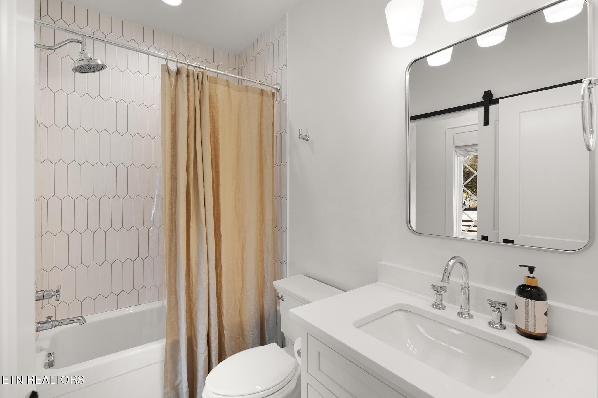 3693 Herschel Hudson Road Lascassas, TN 37085 - Photo 28 of 51 a bathroom with a sink a toilet and shower