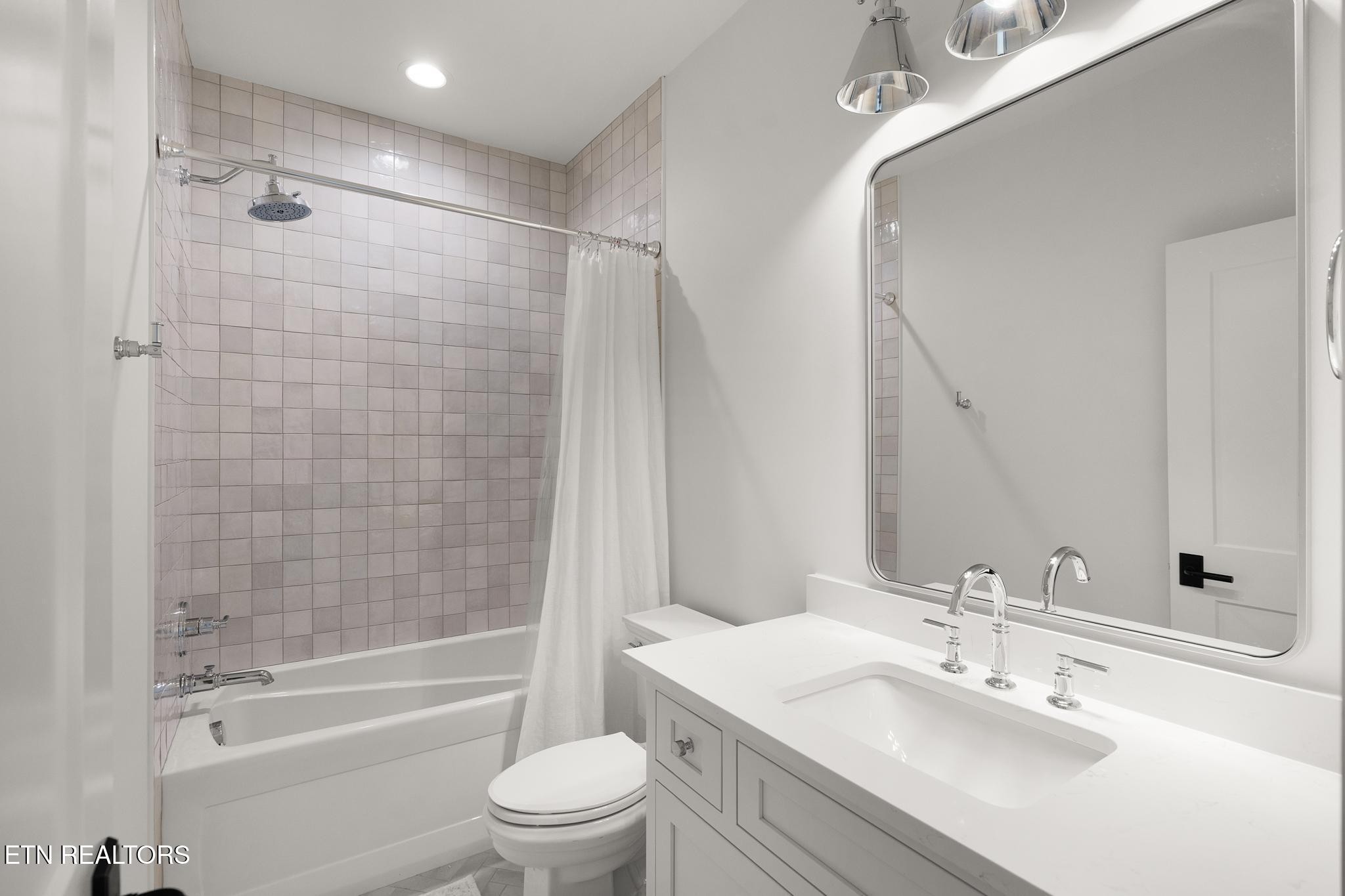 3693 Herschel Hudson Road Lascassas, TN 37085 - Photo 32 of 51 a bathroom with a sink toilet and shower