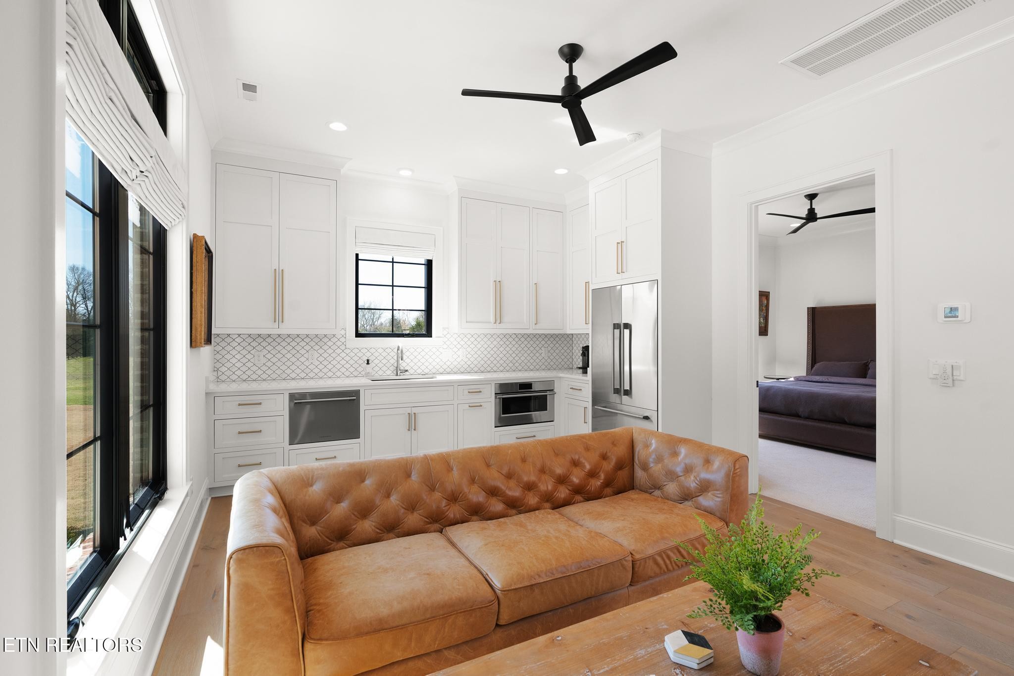 3693 Herschel Hudson Road Lascassas, TN 37085 - Photo 39 of 51 a living room with furniture and a fireplace