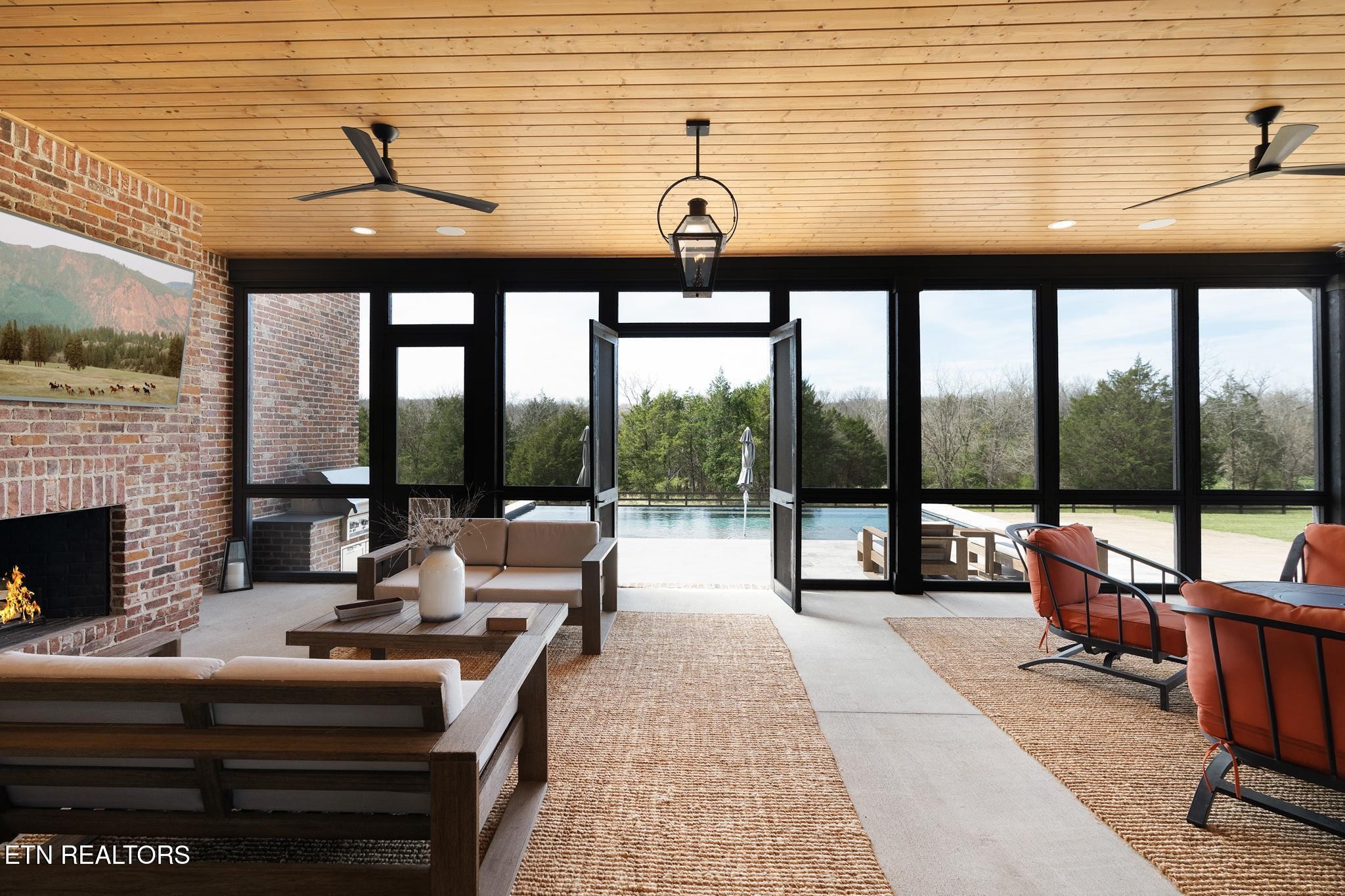 3693 Herschel Hudson Road Lascassas, TN 37085 - Photo 43 of 51 a living room with fireplace furniture and a large window