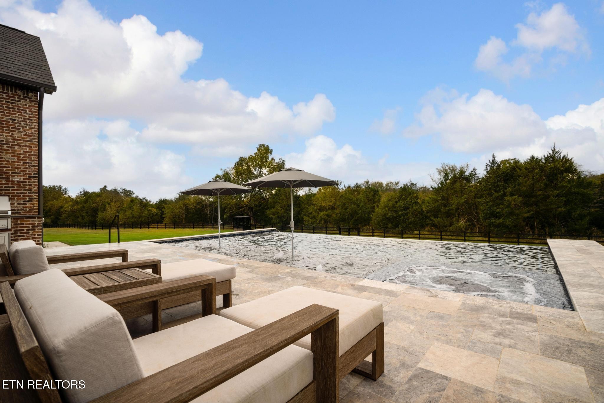 3693 Herschel Hudson Road Lascassas, TN 37085 - Photo 47 of 51 a view of roof deck with couches and sky view