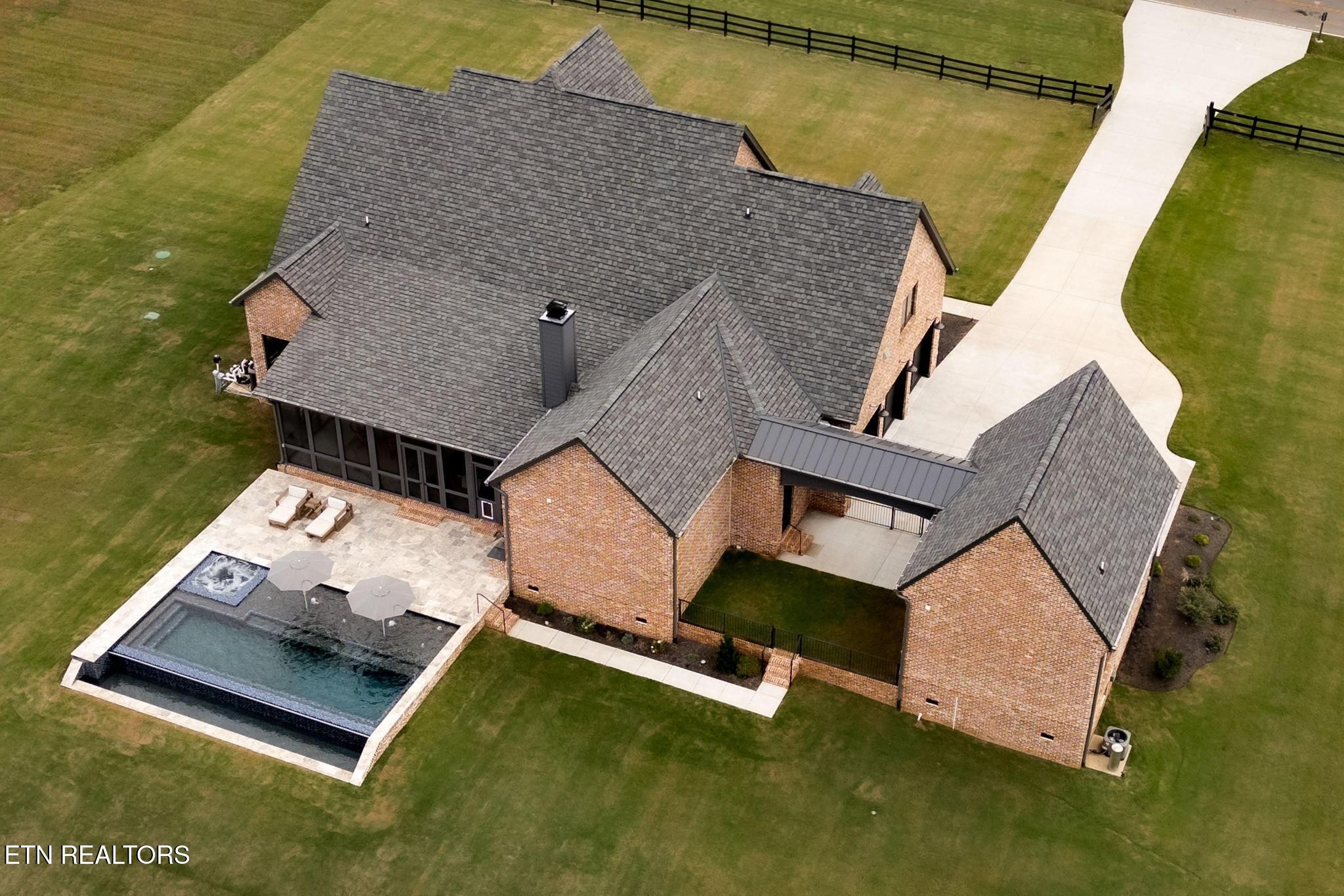 3693 Herschel Hudson Road Lascassas, TN 37085 - Photo 49 of 51 an aerial view of a house with swimming pool