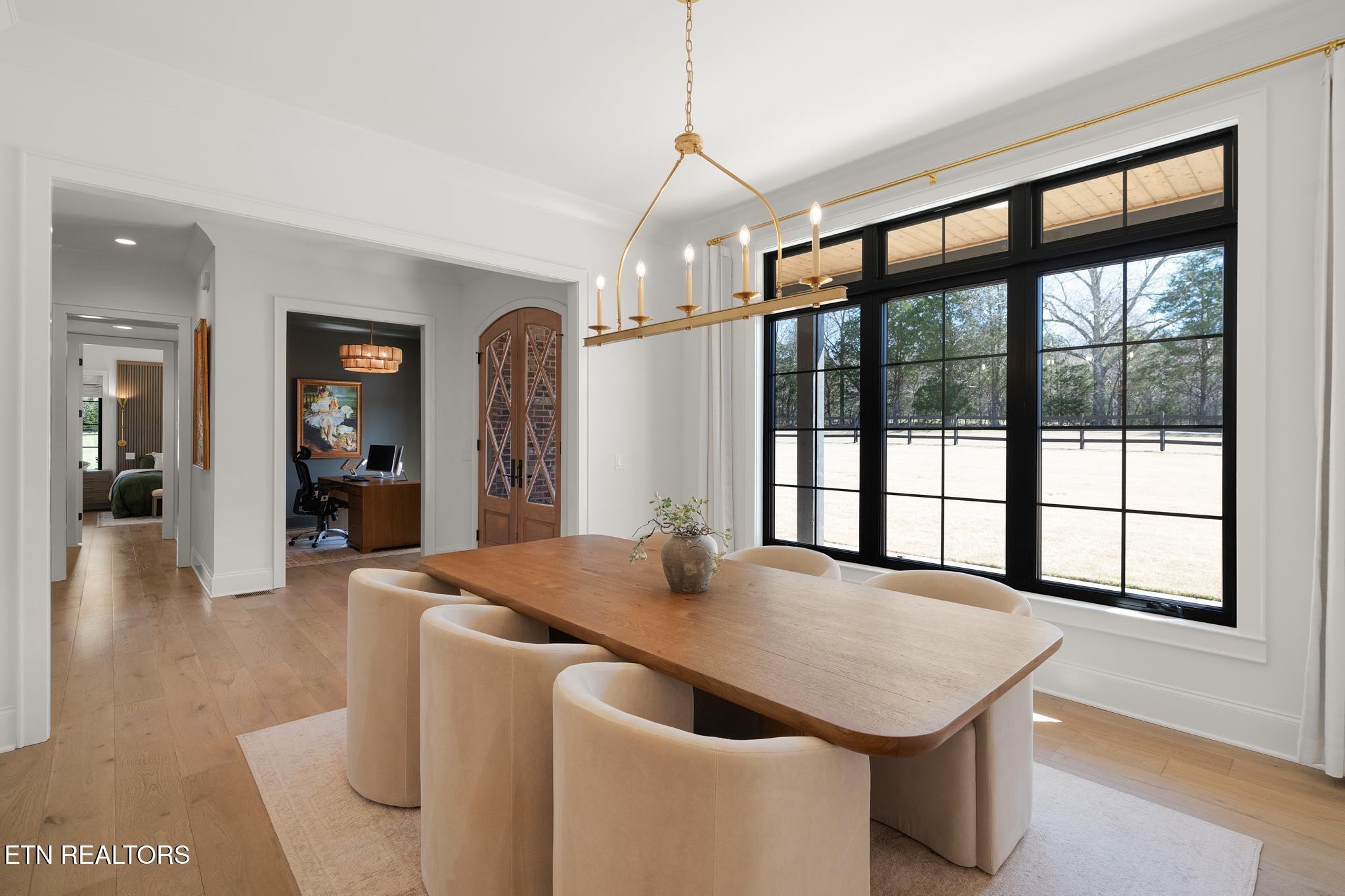 3693 Herschel Hudson Road Lascassas, TN 37085 - Photo 8 of 51 a living room with stainless steel appliances granite countertop furniture a fireplace and a large window