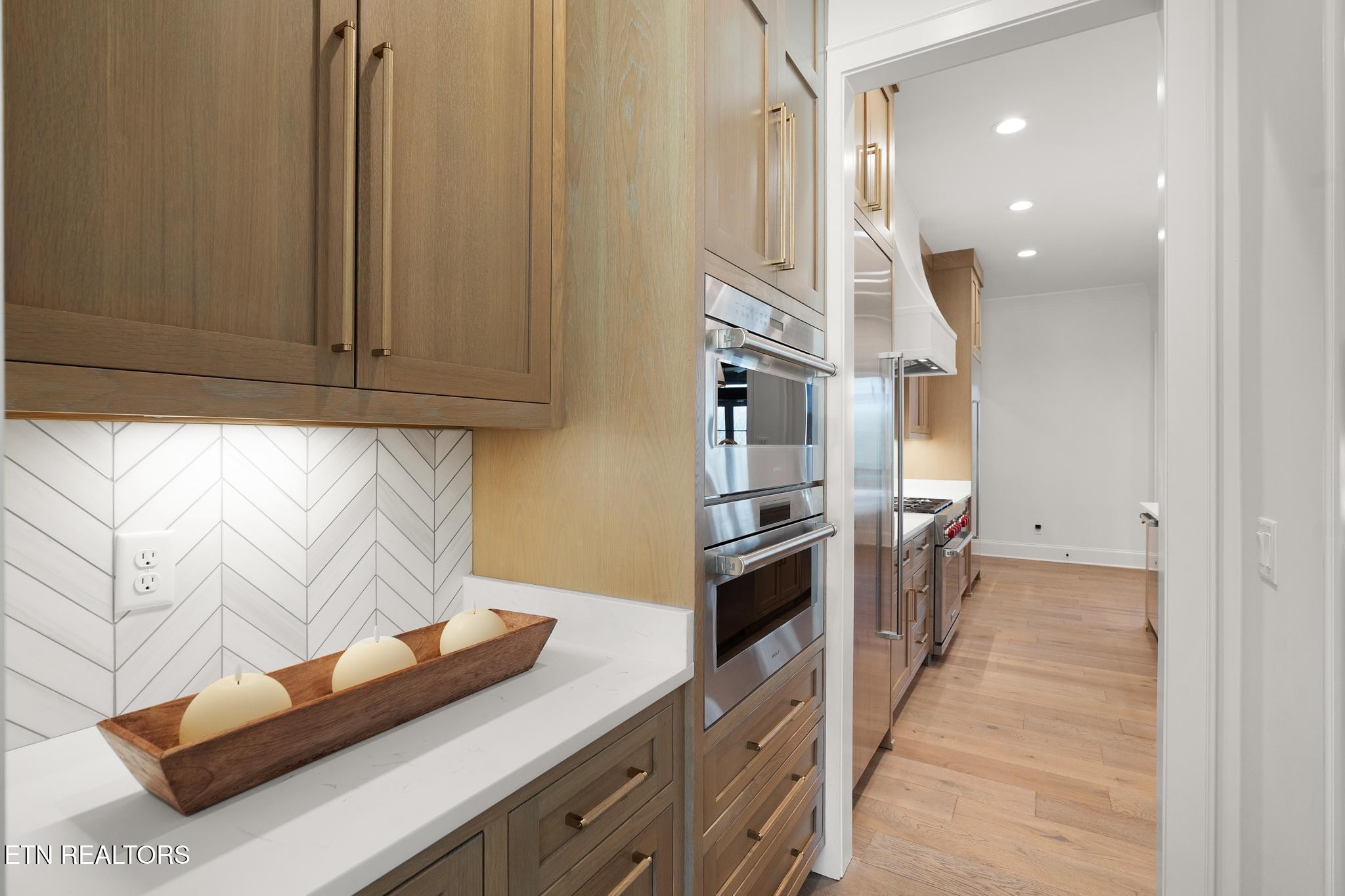 3693 Herschel Hudson Road Lascassas, TN 37085 - Photo 10 of 51 a kitchen with stainless steel appliances granite countertop a sink a stove and a refrigerator