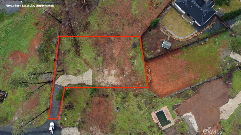 6881 Pentz Road Paradise, CA 95969 - Photo 1 of 10 an aerial view of a house with a yard and garden