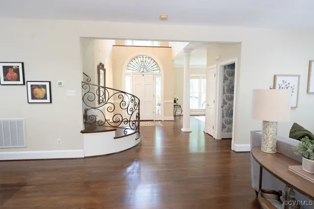a view of a livingroom with wooden floor