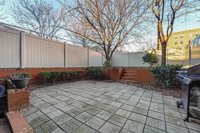 a view of a back yard of the house