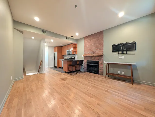a view of a livingroom with a fireplace