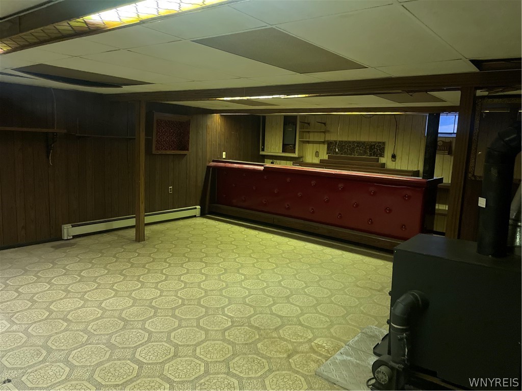 1380 Harlem Road Cheektowaga, NY 14206 - Photo 34 of 49 Basement Bar and Wood Burning Stove