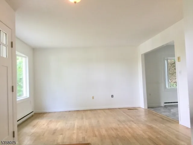 an empty room with window