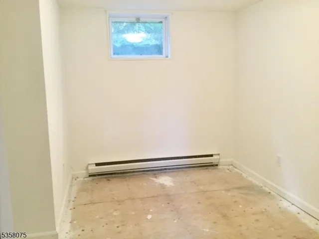 a view of a room with an empty space