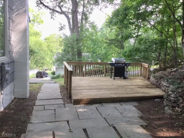 a view of outdoor space with garden and sitting area