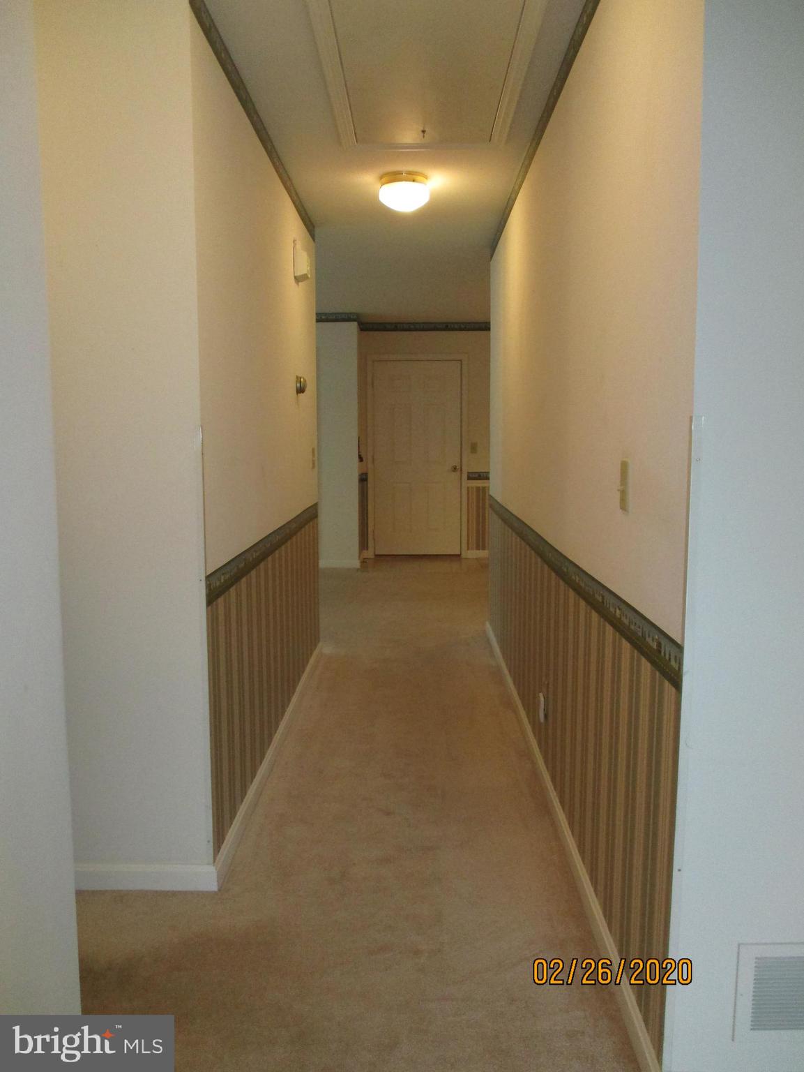 3016 Lakefield Road York, PA 17402 - Photo 22 of 42 Hallway offers pull down stairs to "attic" space