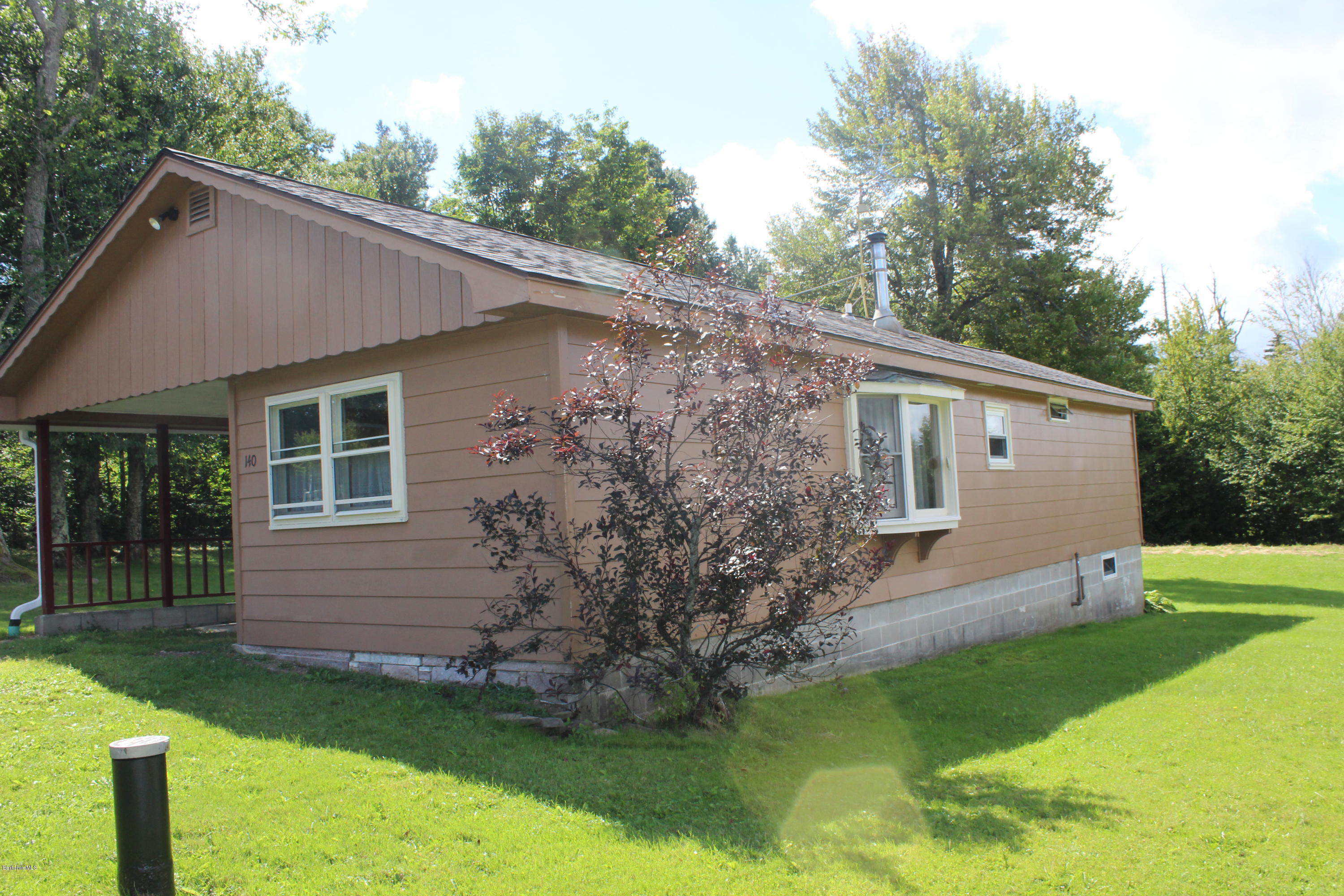 140 Windsor Road Savoy, MA 01256 - Photo 16 of 16 a view of a house with a yard