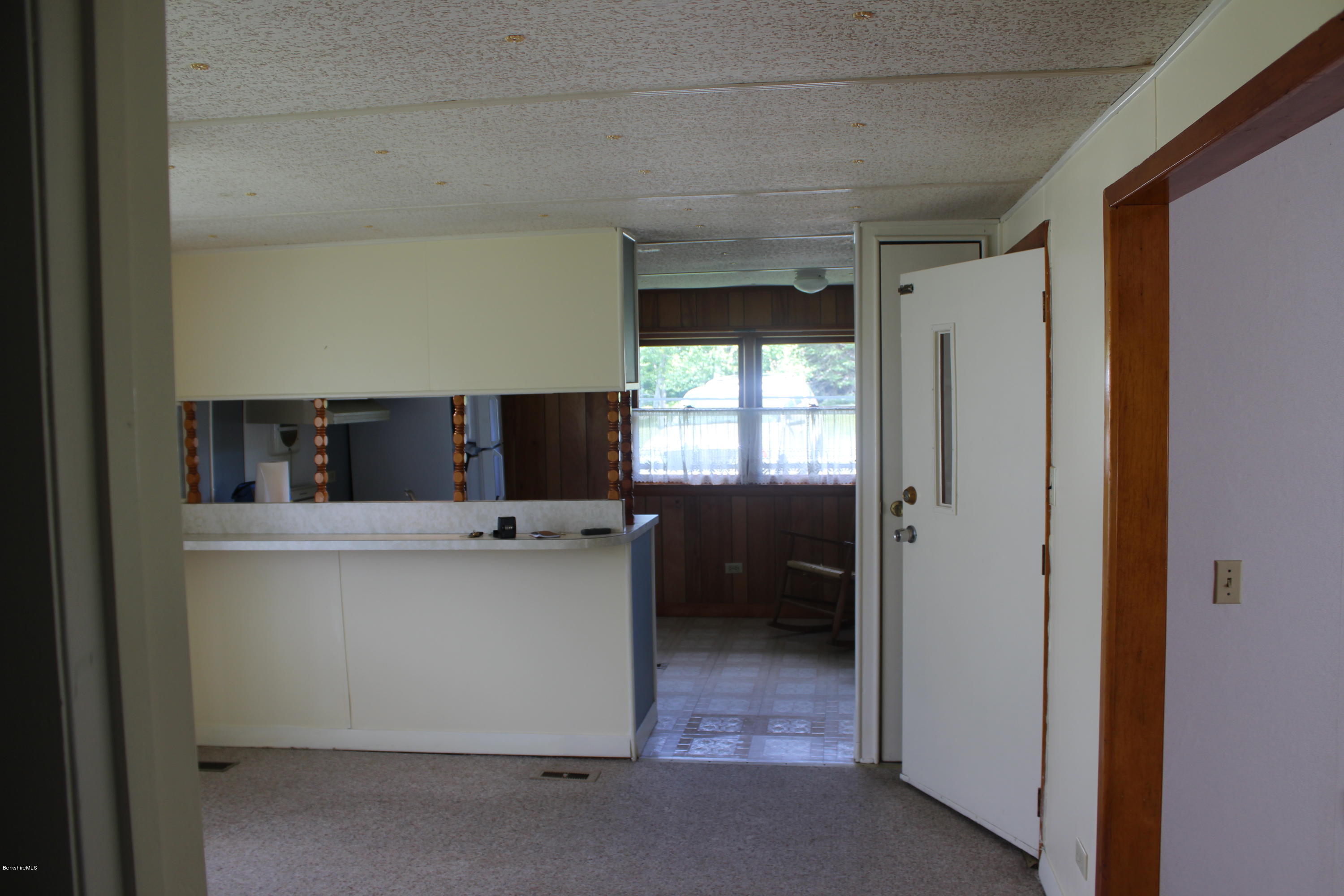 140 Windsor Road Savoy, MA 01256 - Photo 7 of 16 a kitchen with stainless steel appliances a sink and a refrigerator