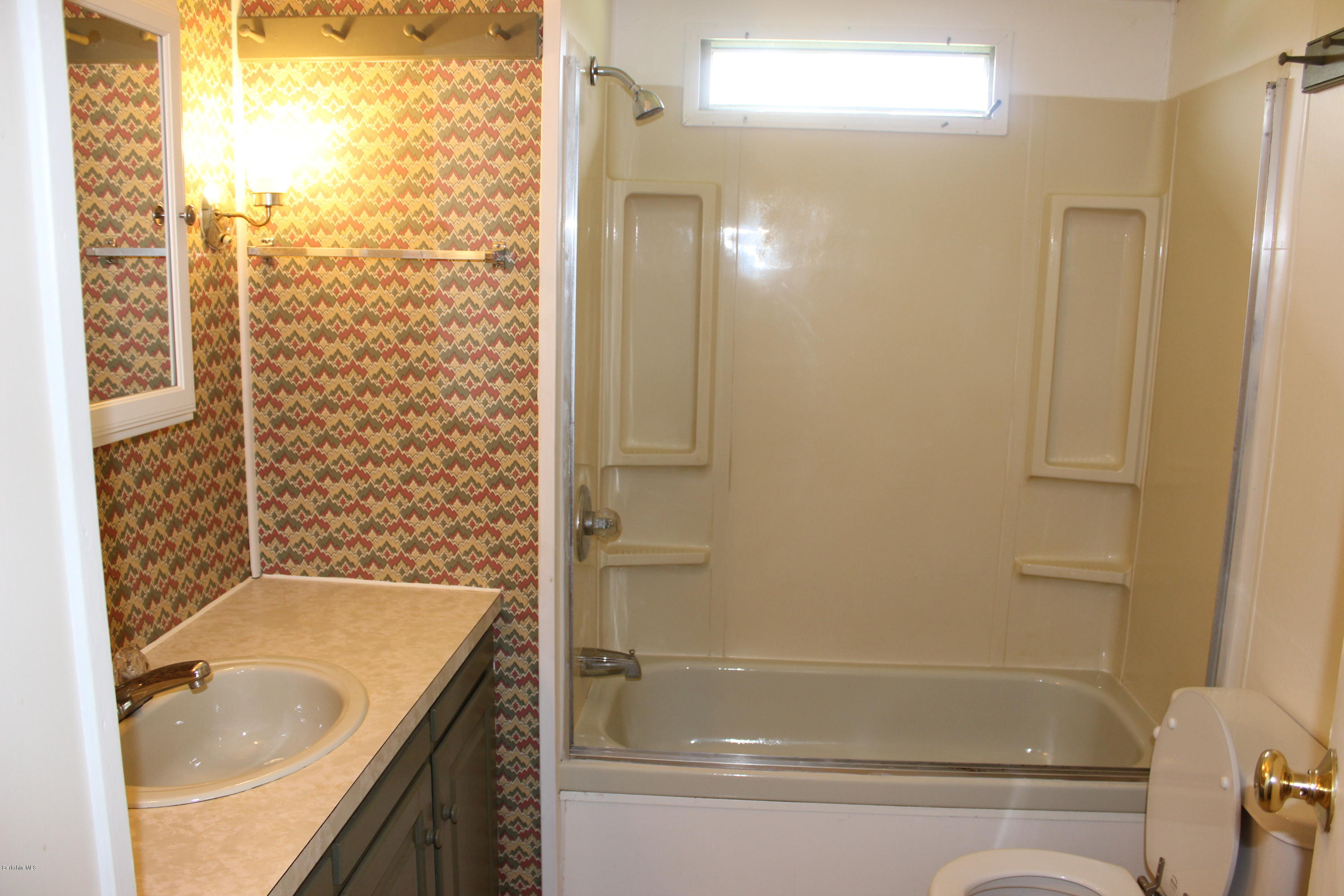 140 Windsor Road Savoy, MA 01256 - Photo 8 of 16 a bathroom with a granite countertop sink toilet and shower