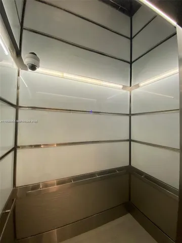 a view of a room with racks on the wall