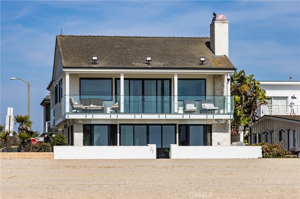 6110 West Oceanfront Newport Beach, CA 92663 - Photo 28 of 33 a view of house with a outdoor space
