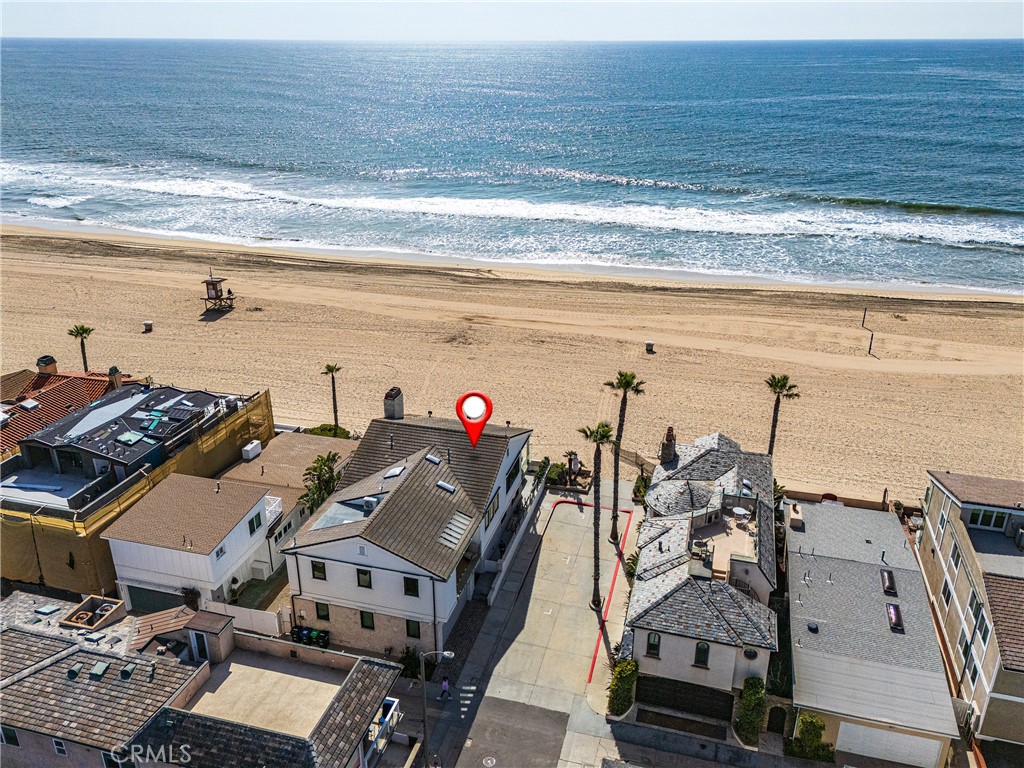 6110 West Oceanfront Newport Beach, CA 92663 - Photo 31 of 33 a view of a ocean with many windows