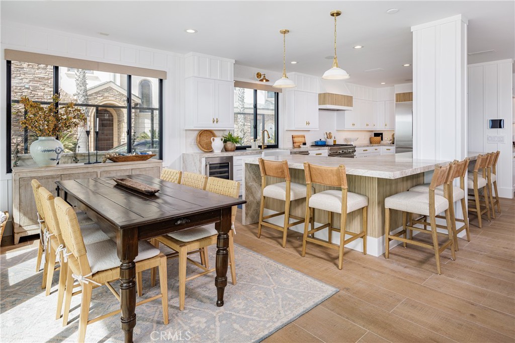 6110 West Oceanfront Newport Beach, CA 92663 - Photo 5 of 33 a view of a dining room with furniture window and outside view