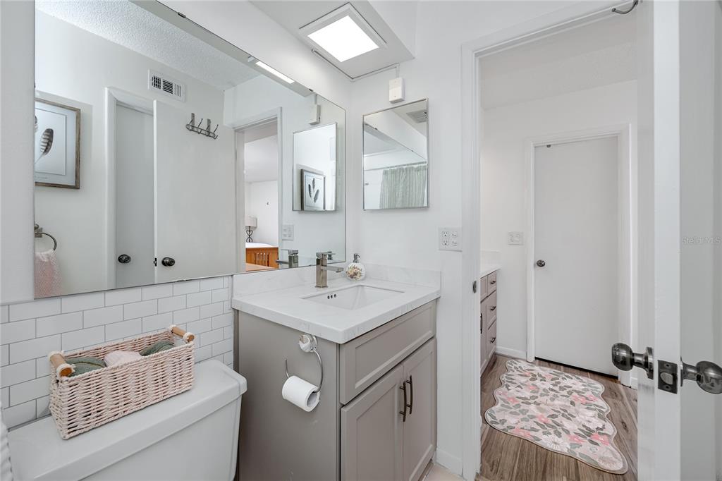 2207 Belleair Road, Unit B30 Clearwater, FL 33764 - Photo 19 of 39 a bathroom with a sink toilet and shower