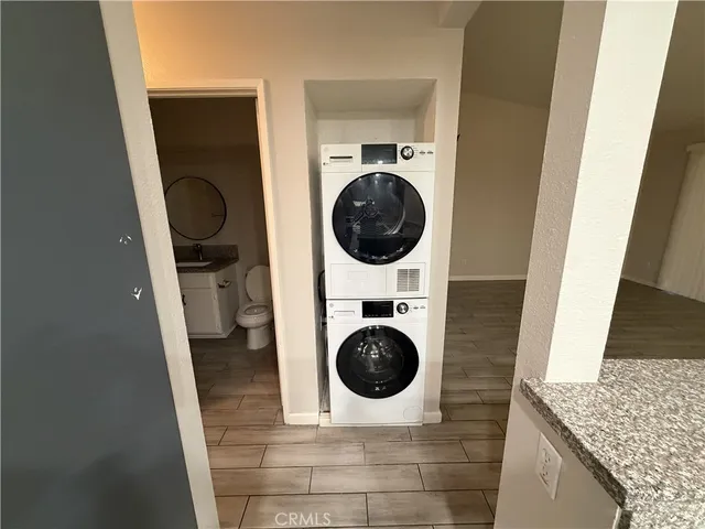 a close view of a washer and dryer in a bathroom