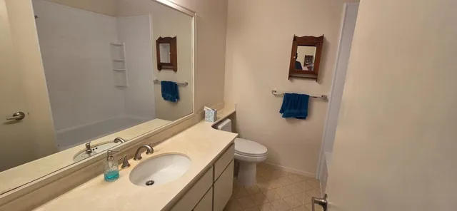 a bathroom with a toilet