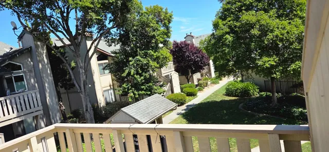 a view of a car park in front of a building