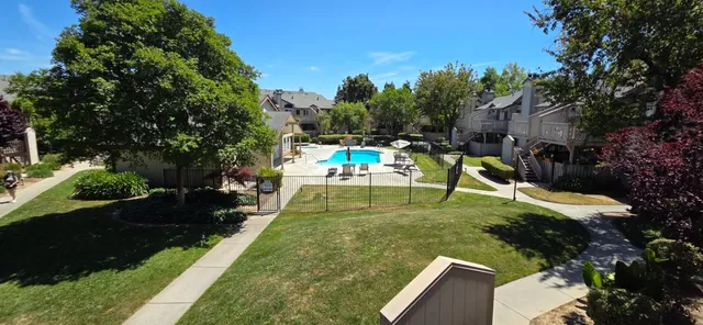 a view of a street with cars