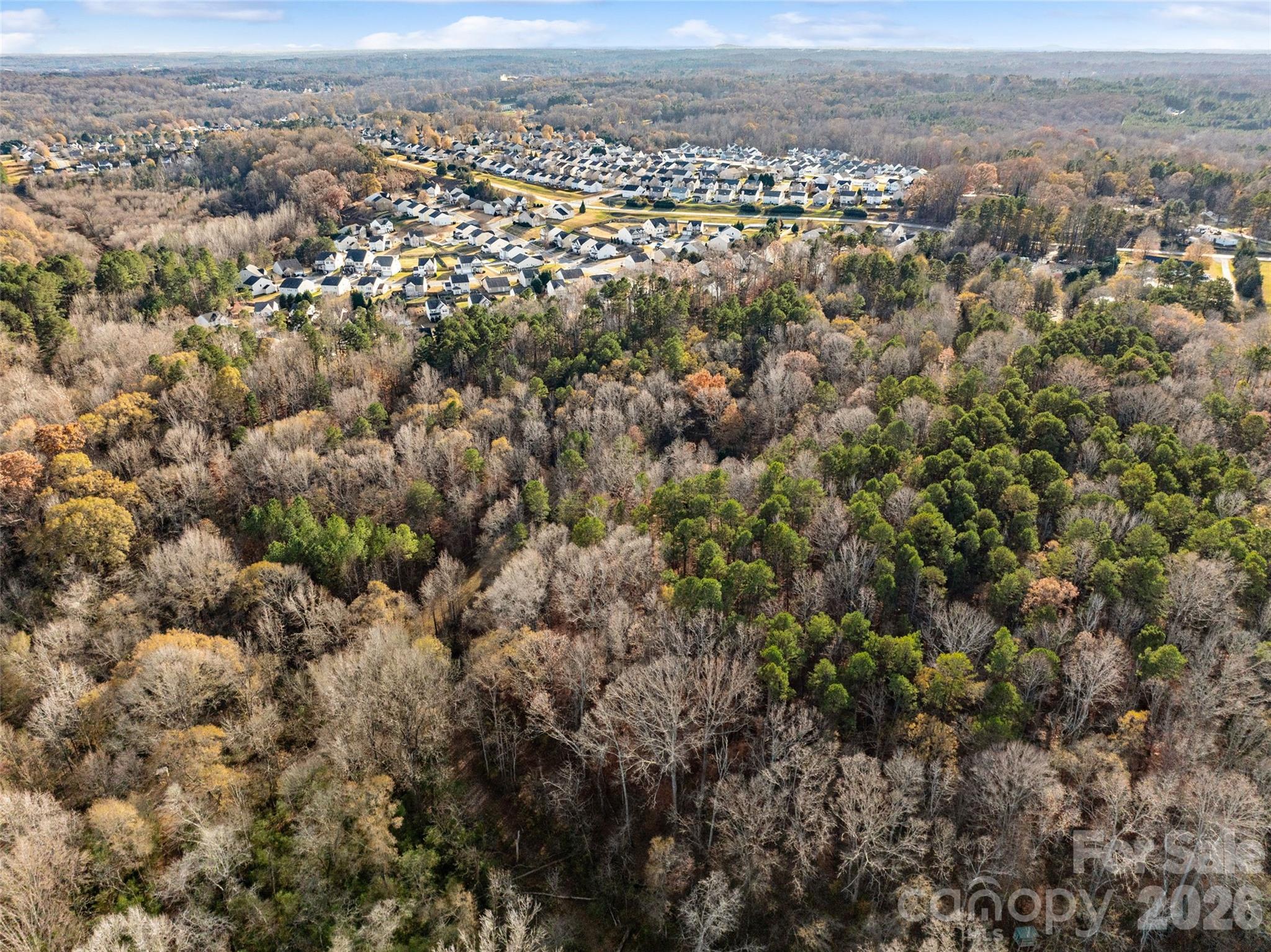 0 Sandy Ford Road Mount Holly, NC 28120 - Photo 4 of 13 an aerial view of a house with a city