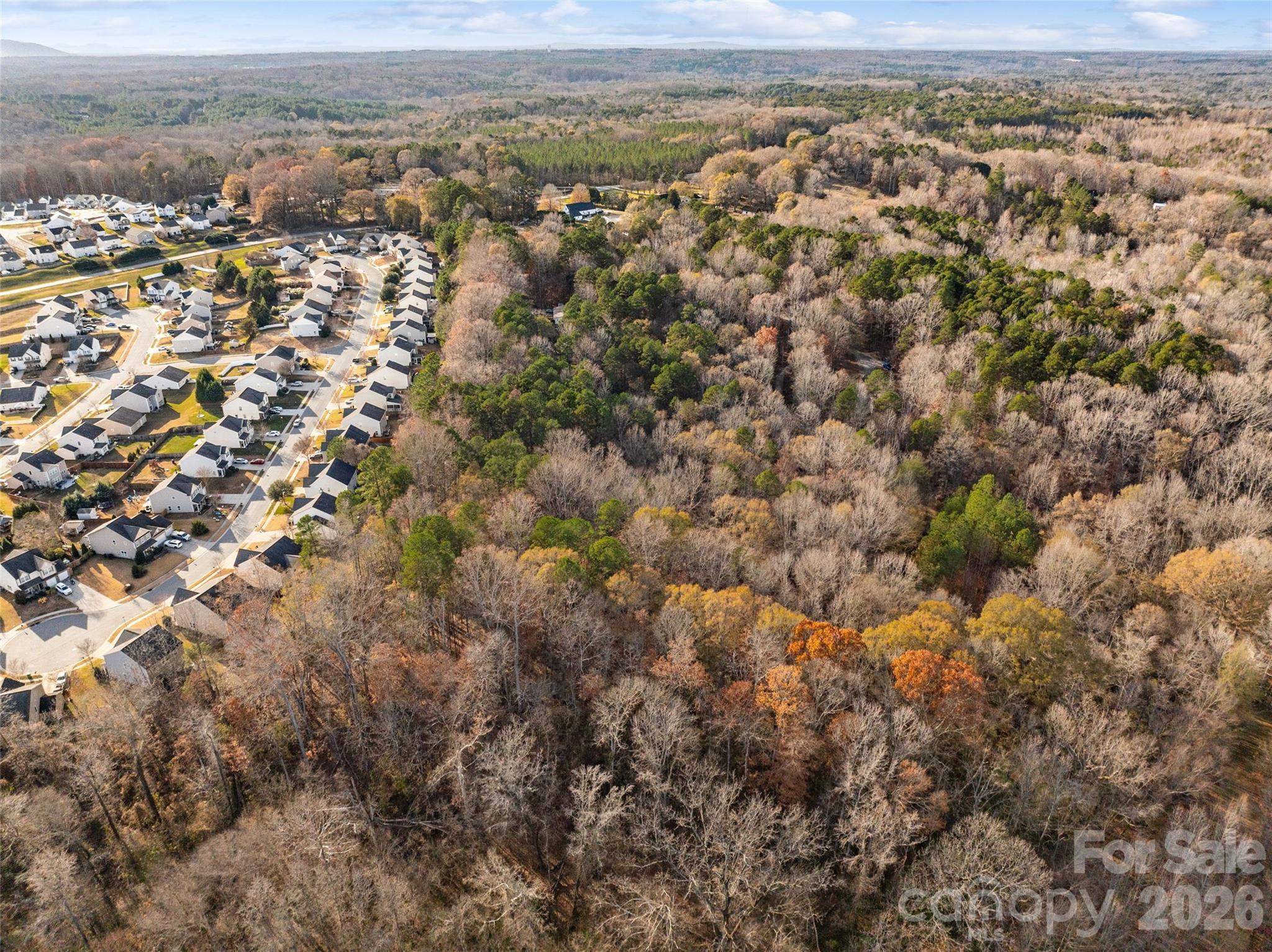 0 Sandy Ford Road Mount Holly, NC 28120 - Photo 5 of 13 an aerial view of town with residential houses with outdoor space