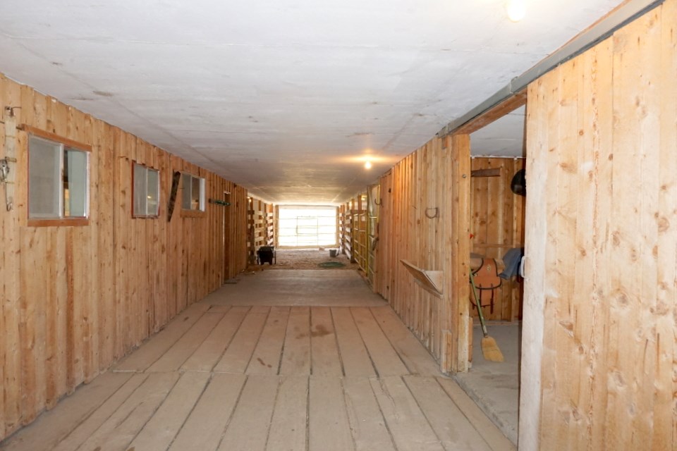42265 Piburn Flats Road Crawford, CO 81415 - Photo 24 of 35 a view of a hallway with wooden floor and staircase