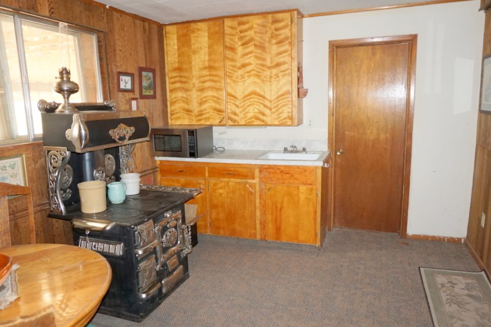 42265 Piburn Flats Road Crawford, CO 81415 - Photo 26 of 35 a bathroom with a sink and a mirror