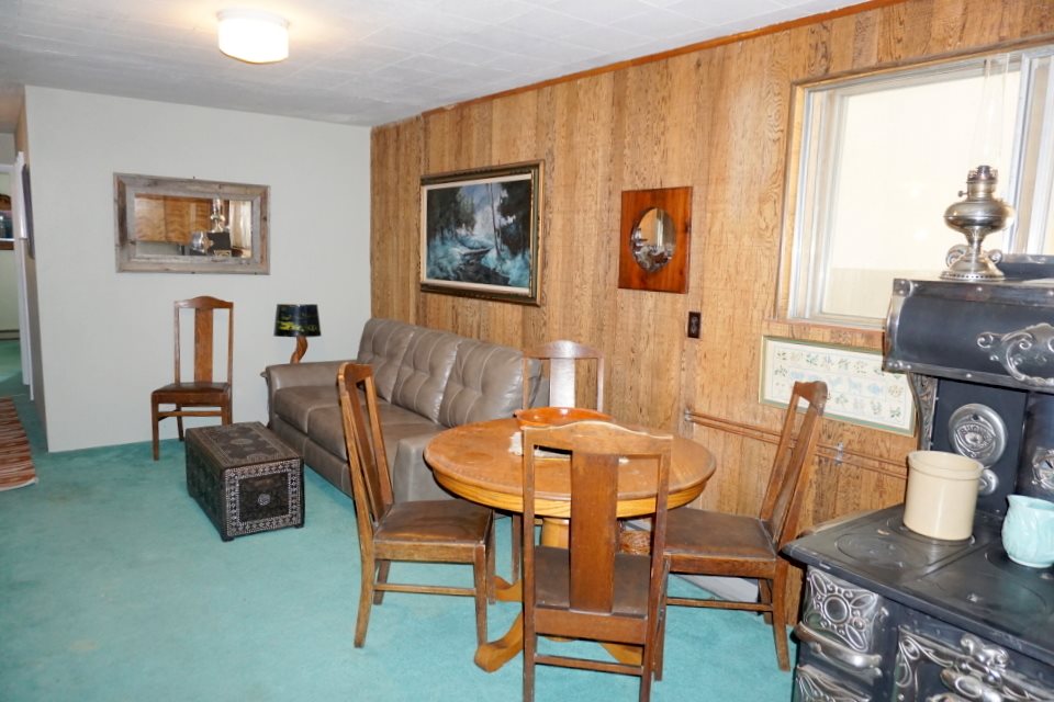 42265 Piburn Flats Road Crawford, CO 81415 - Photo 27 of 35 a view of a dining room with furniture and a window